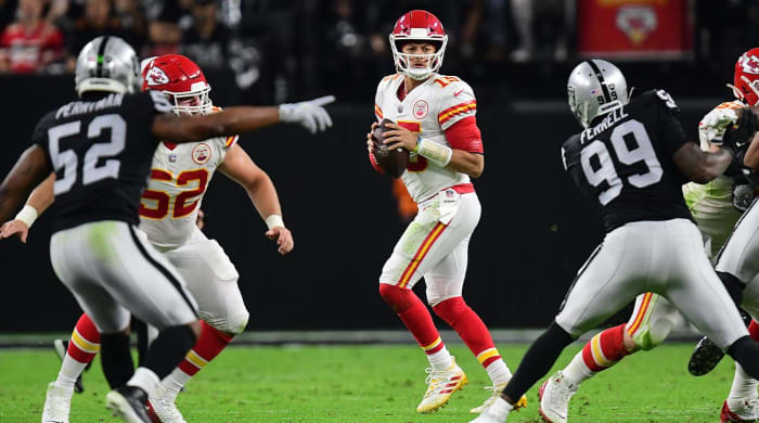 Nov 14, 2021; Paradise, Nevada, USA; Kansas City Chiefs quarterback Patrick Mahomes (15) drops back to pass against the Las Vegas Raiders during the first half at Allegiant Stadium.